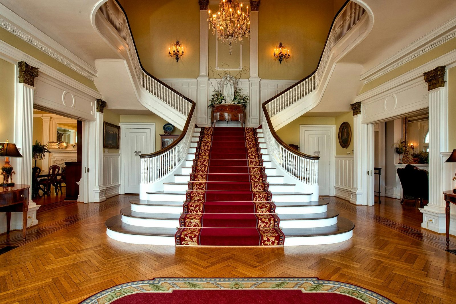 Elegant grand staircase in a luxury home, maintained by Modern Cleanings, professional high-end cleaning services in Austin, TX.